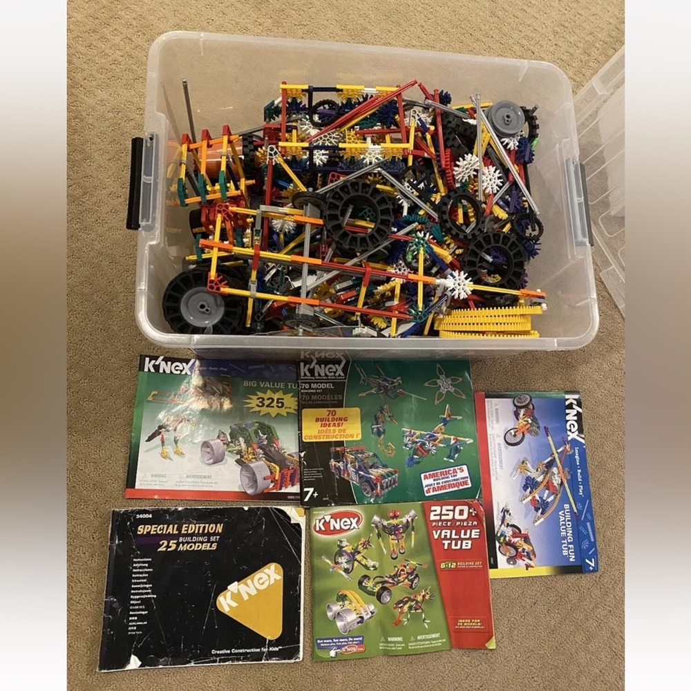 HUGE LOT OF K’NEX - MULTIPLE COMBINED SETS WITH MANUALS, DINOSAUR, ROCKET,CARS